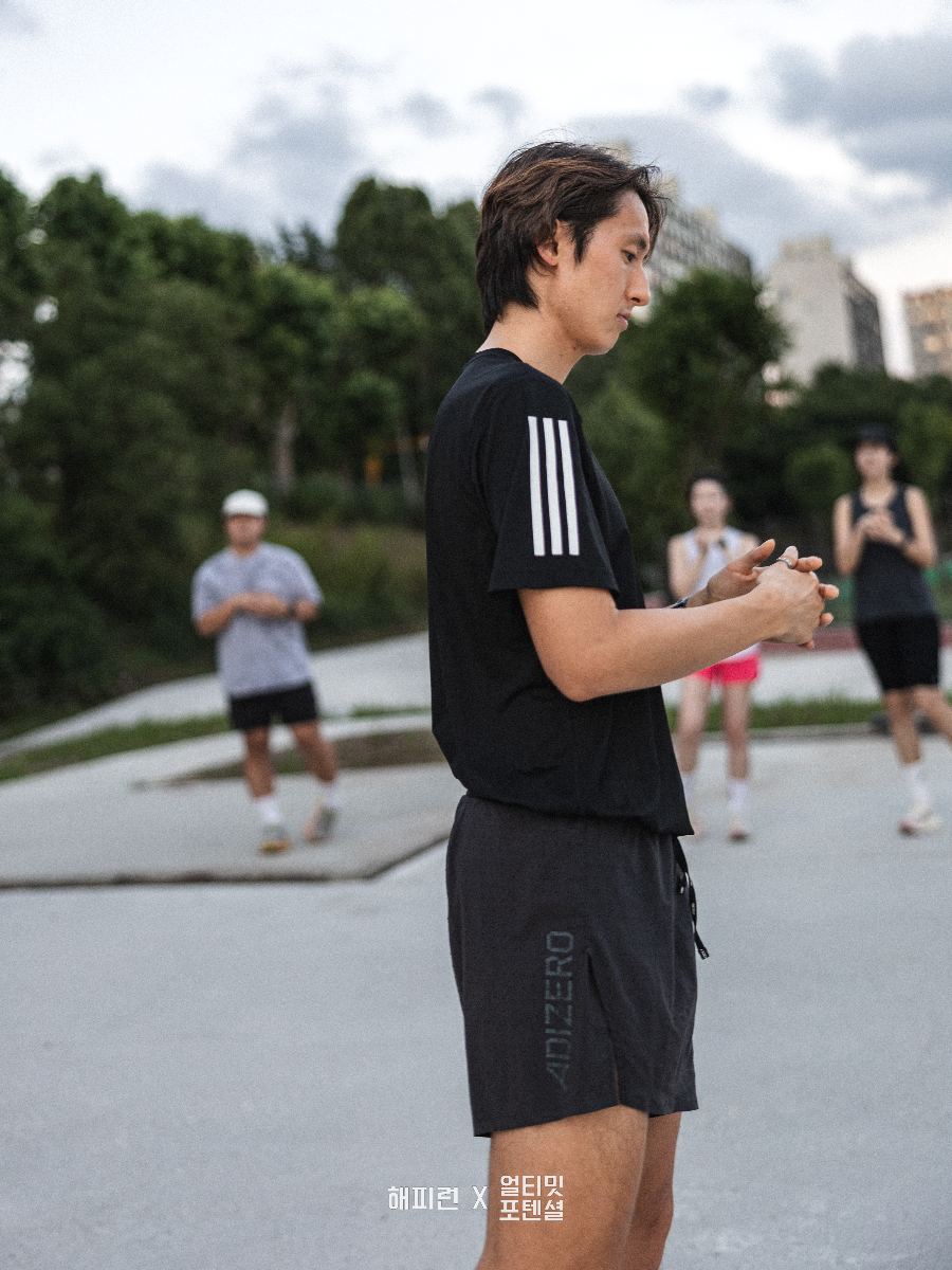 Running crew warming up together before a session